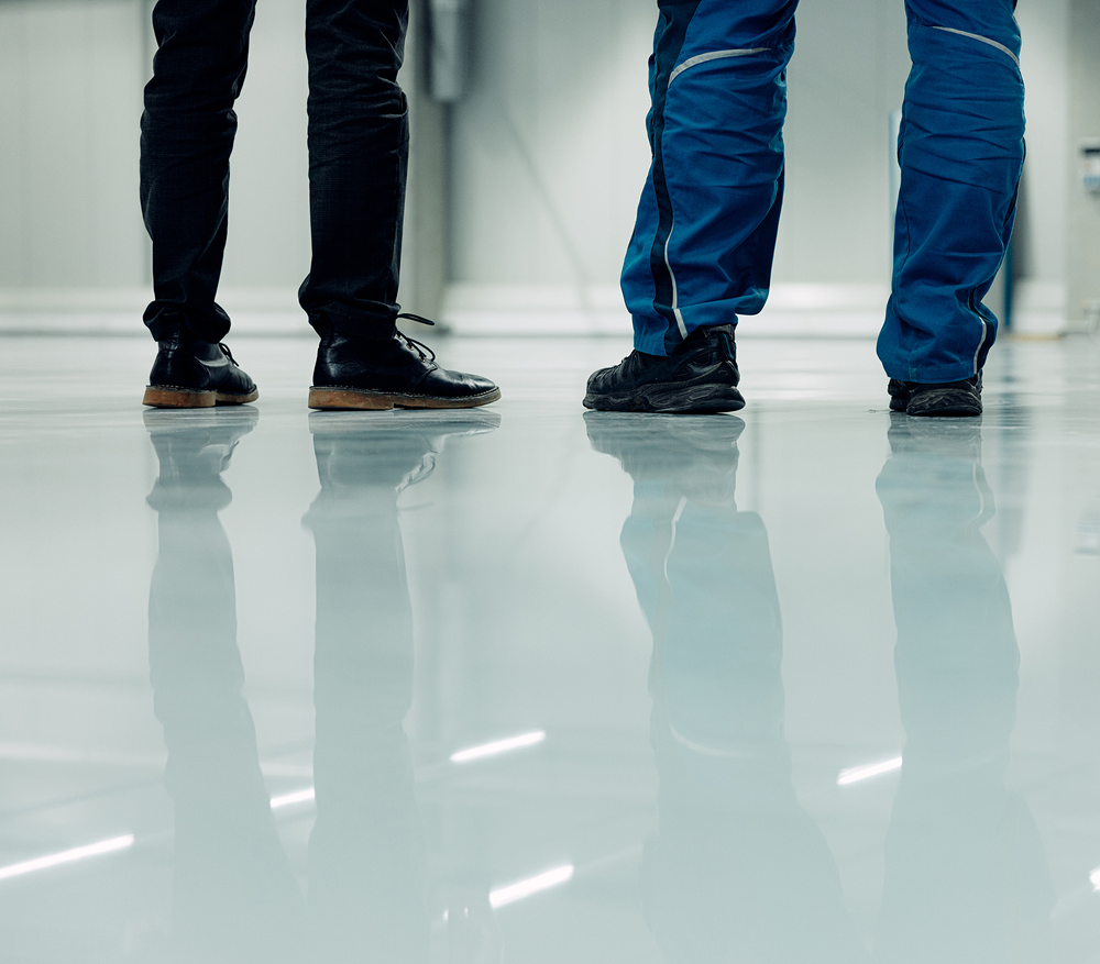 Reflections of legs on glossy surface